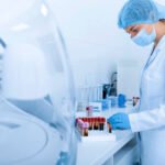 Woman collecting blood samples for testing on different diseases